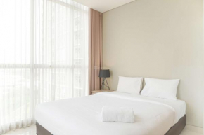 Homey and Warm 1BR at Ciputra International Apartment By Travelio